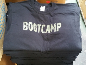 An image of a black bootcamp t-shirt