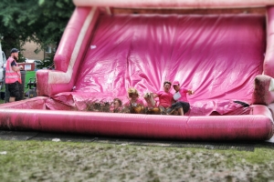 An image of the 'Mad Mud Spinners' doing the Race For Life